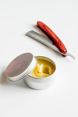 white desktop with tools for shaving beards