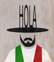 man wearing word hola hat on wood grain texture © jdoms