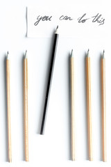 concept selection options with pencils on white background top view