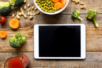 concept diet and tablet with vegetables mock up