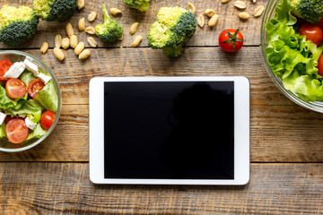 concept diet and tablet with vegetables mock up