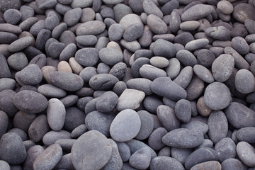 Grey, blue, gold wee pebbles background, South Miami Beach, Florida, USA
