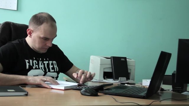American Company Accounting Manager Man Calculate Monthly Financial Payments