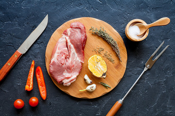 concept cooking meat steak on dark background top view