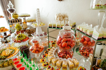 Delicious wedding reception candy bar dessert table