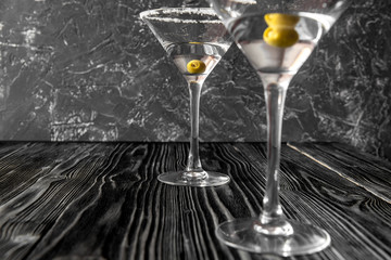 martini cocktail at wooden background close up