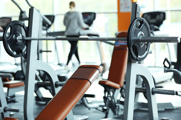 Fototapeta premium Barbell on rack in gym