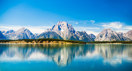 Fototapeta na wymiar Grand Teton National Park, Wyoming. Reflection of mountains on Jackson Lake near Yellowstone.