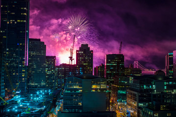Fireworks over downtown San Francisco, California, USA.  Cityscape at Night.  Transbay terminal...