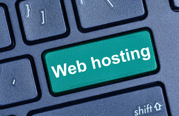 Web hosting words on computer keyboard