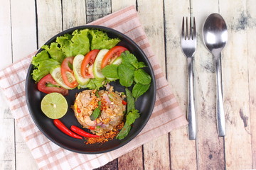 Fototapeta na wymiar Fried rice with spicy minced pork salad