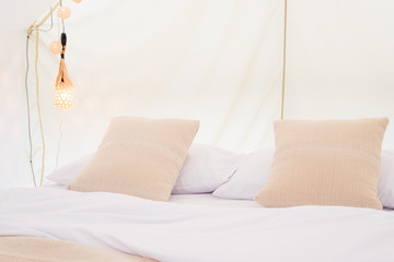 Inside a large white tent camp