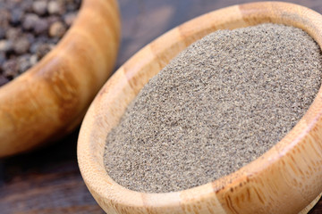 Black pepper in a bowls on table