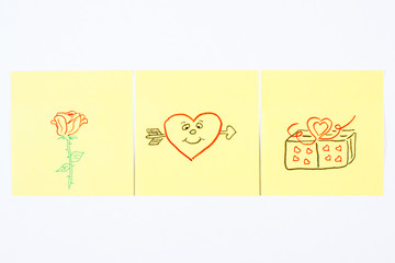 Fototapeta na wymiar Symbols of Valentines Day drawn on paper, symbol of love