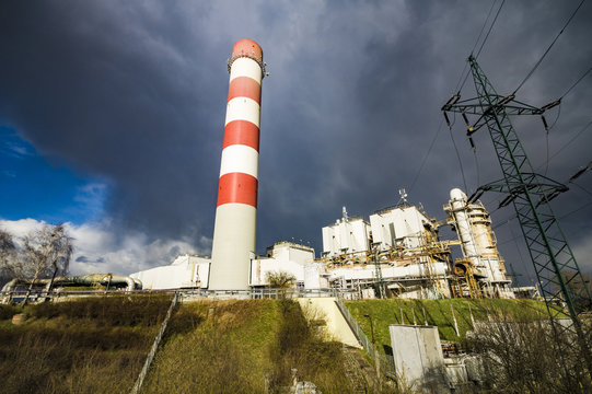 power plant in Szczecin against passing menacing storm cloud