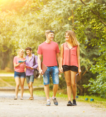 Fototapeta premium group of happy students in a Park on Sunny day..