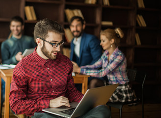 officer of the company with laptop on the background  business