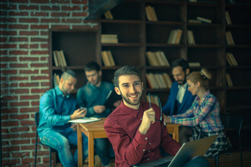 officer of the company with laptop on the background  business