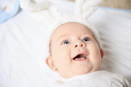 portrait of adorable baby in Bunny suit..