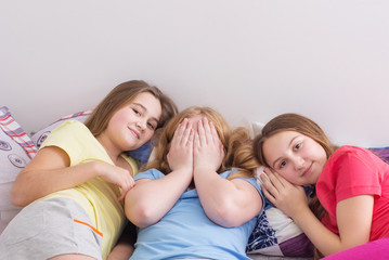 three happy girls at home