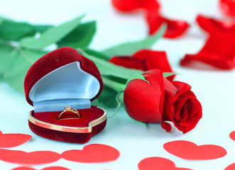 Rose and box with rings on a white background, hearts