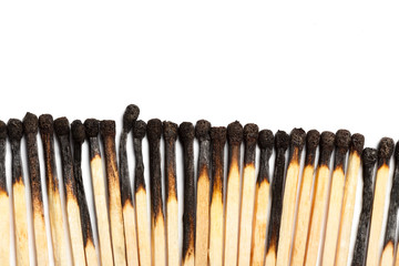 Matches isolated on white background. Closeup shot.