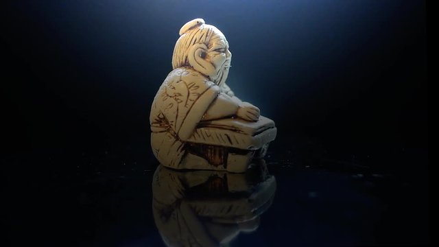 Netsuke Custodian of time. Writes good sleeps, that must be fulfilled and bring happiness.
