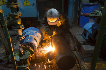 The old equipment repairing and welding at a power station