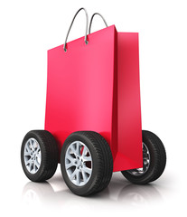 Red paper shopping bag with car wheels
