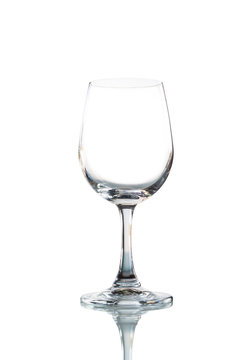 Empty wine glass isolated with reflect on white background