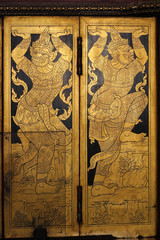 Giants image on windows, Temple in bangkok, thailand