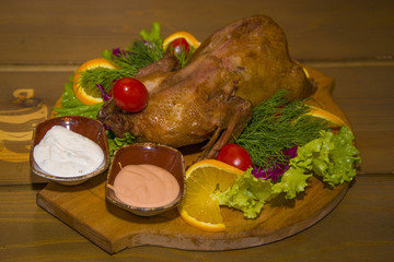 Roast partridge with fresh vegetables.