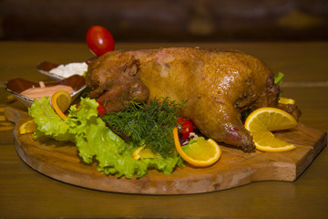 Roast partridge with fresh vegetables.