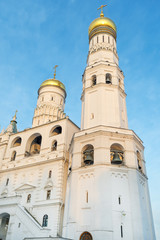 Fototapeta na wymiar Historic Ivan the Great Bell tower in Kremlin Cathedrals, the tallest building of old Moscow 