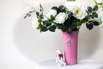 white roses in a vase