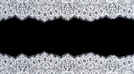 Invitation, greeting or wedding card with white lace on black background