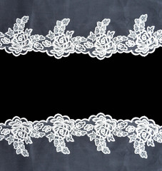 Invitation, greeting or wedding card with white lace on black background