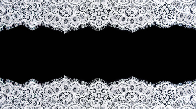 Invitation, greeting or wedding card with white lace on black background