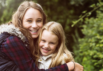 Sister Hug Togetherness Outdoors Girls Concept