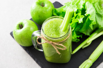 Blended green smoothie with ingredients. Superfood, detox 