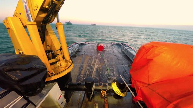 Tug Boat establishes platform lift anchor