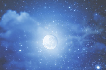 Fototapeta na wymiar Moon and stars on evening sky.