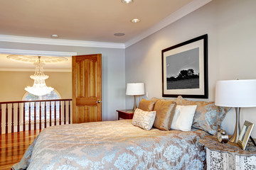 Chic master bedroom interior with queen bed