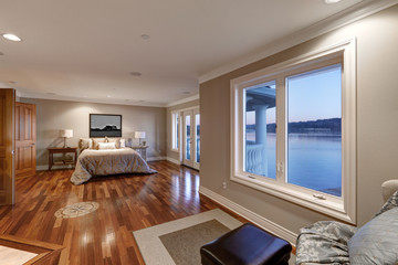 Chic master bedroom interior with private balcony