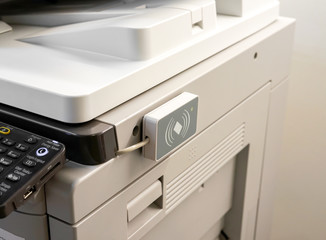 access control for scanning key card to access  Photocopier.