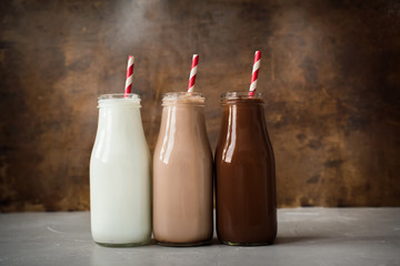 Three Different Sorts Beverage Bottle Wooden Background