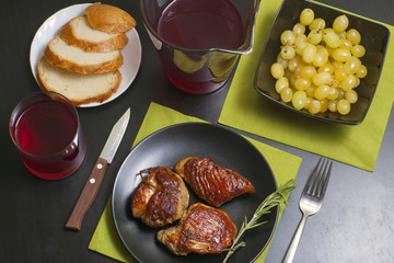 meat with rosemary on a decorated table