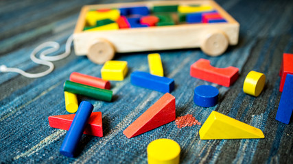 Educational and colorful toys wooden made usable for construction games - obrazy, fototapety, plakaty