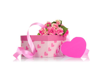 Gift box, flowers and greeting card on white background