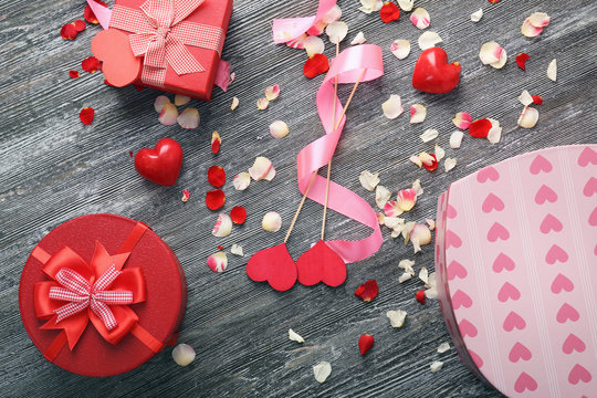 St. Valentines Day concept. Gift boxes and decorations on wooden table